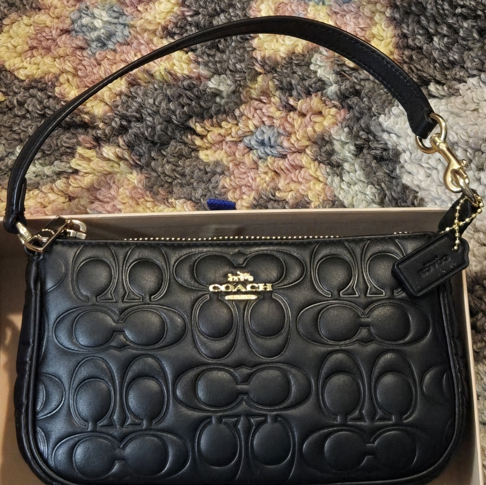 Coach Nolita 19